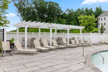 Take a dip in the pool under the shade of the pergola
